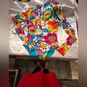 Trina Turk Long Sleeve Zip Up Paddlesuit. NWT size large